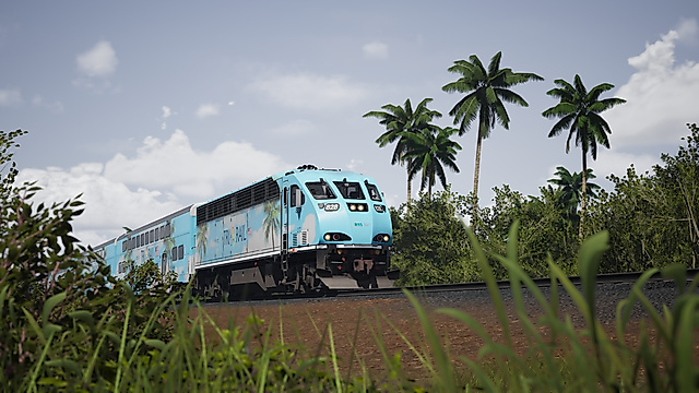 In-game screenshot of a light blue Tri-Rail locomotive pulling double-decker coaches past palm trees.